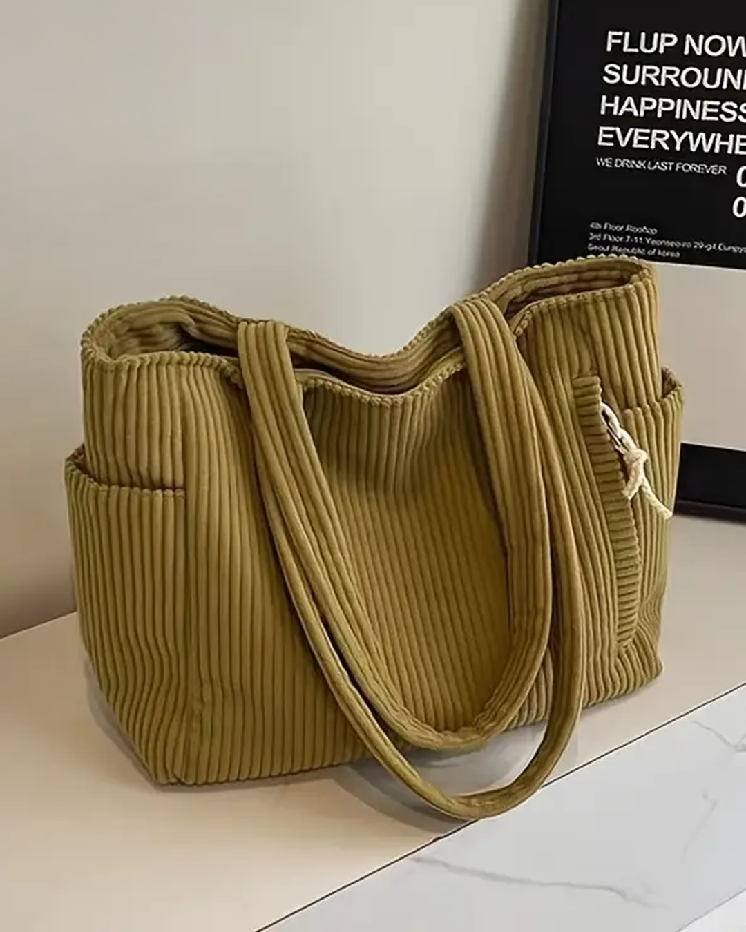 Tilda–Gerippte Tragetasche mit Kordel Detail